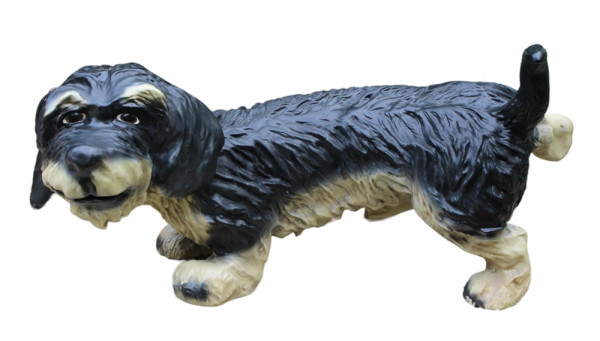 Dekorationsfigur Hund langhaar Dackel pinkelnd H 30 cm Dekofigur aus Kunstharz